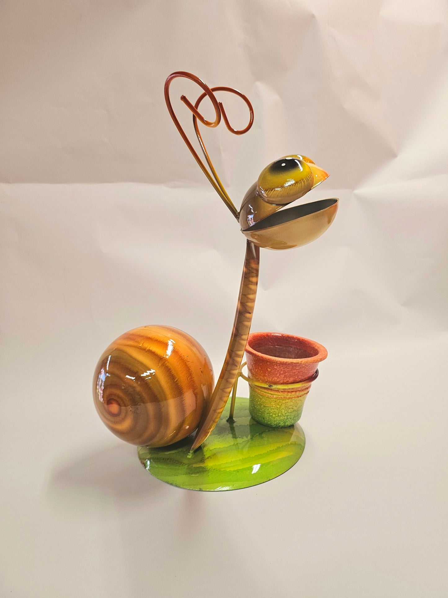 Handcrafted metal snail planter