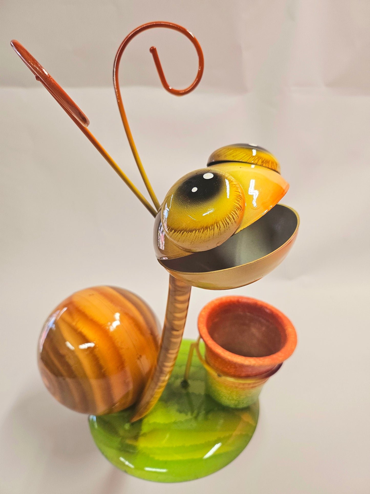 Handcrafted metal snail planter