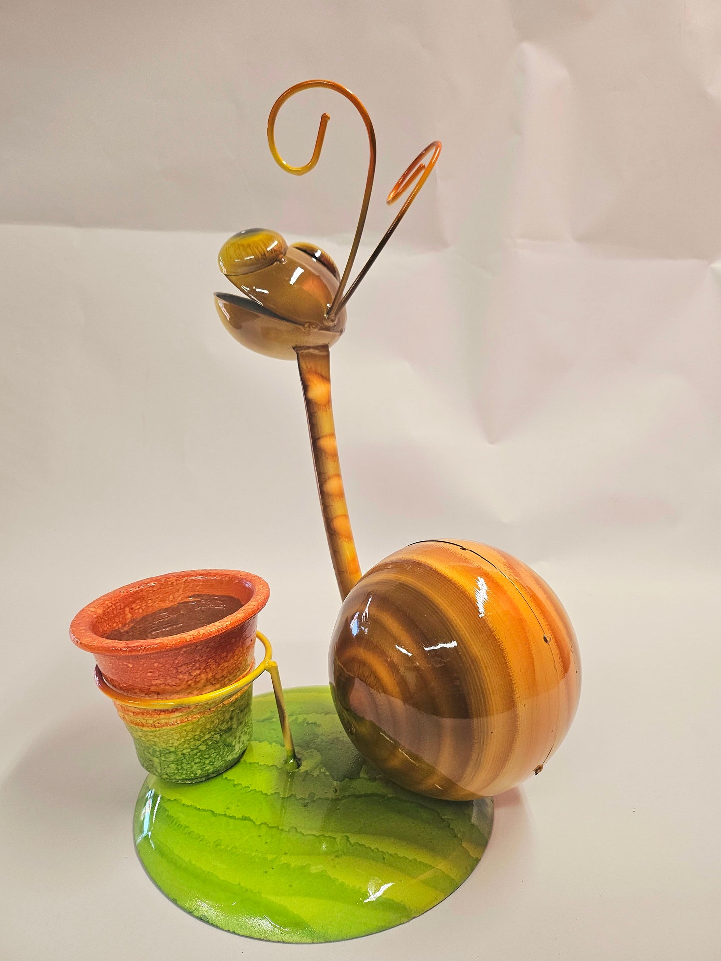 Handcrafted metal snail planter