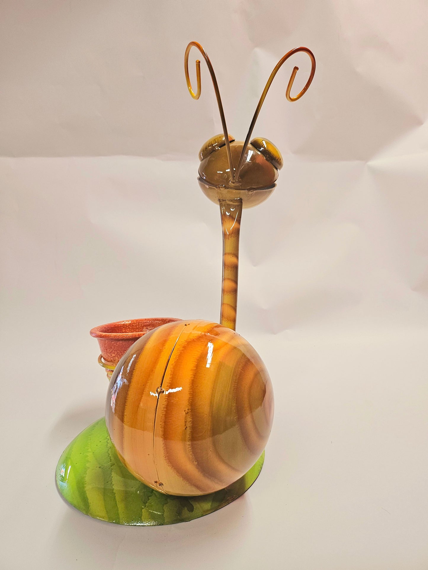 Handcrafted metal snail planter