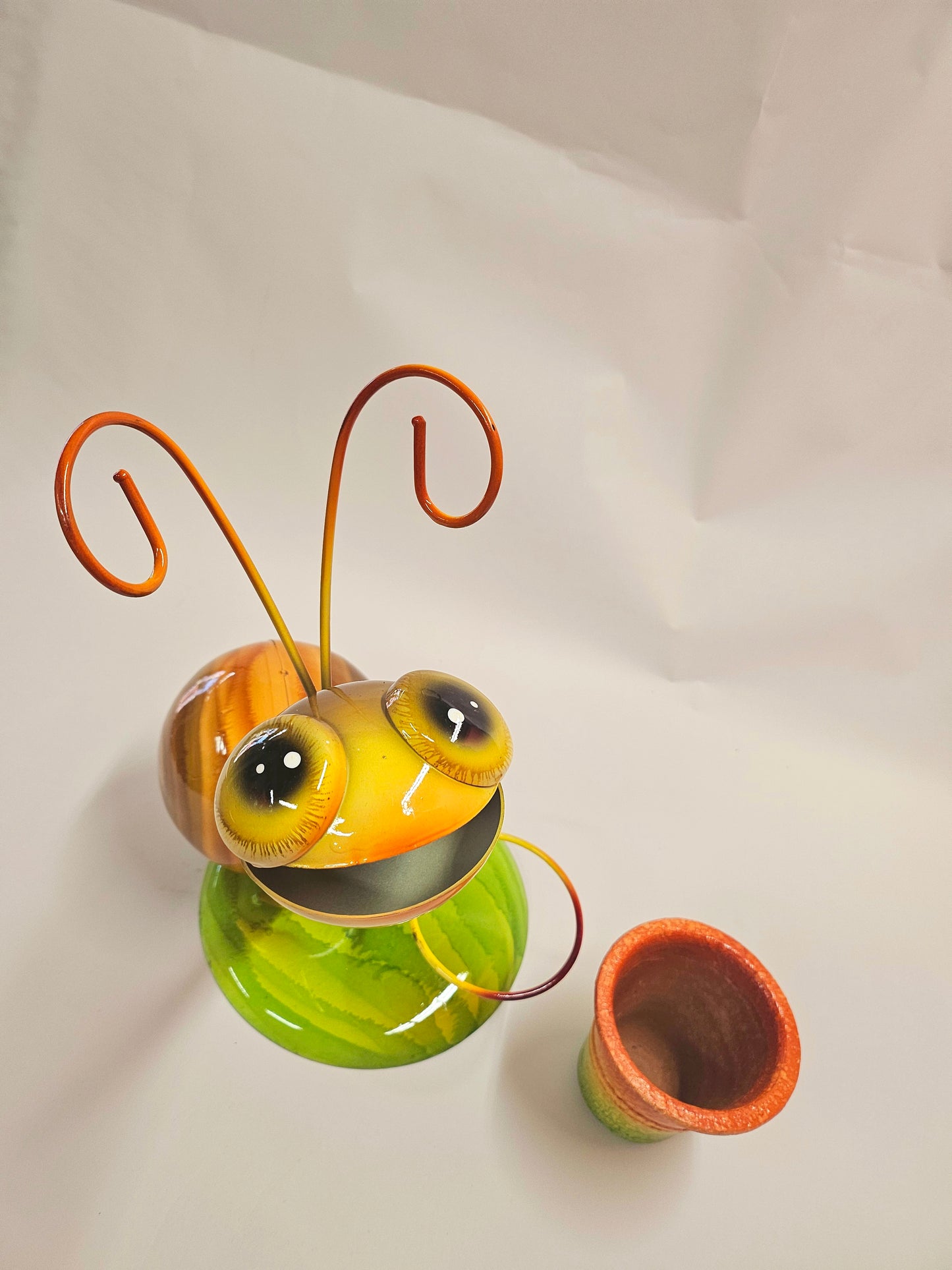 Handcrafted metal snail planter