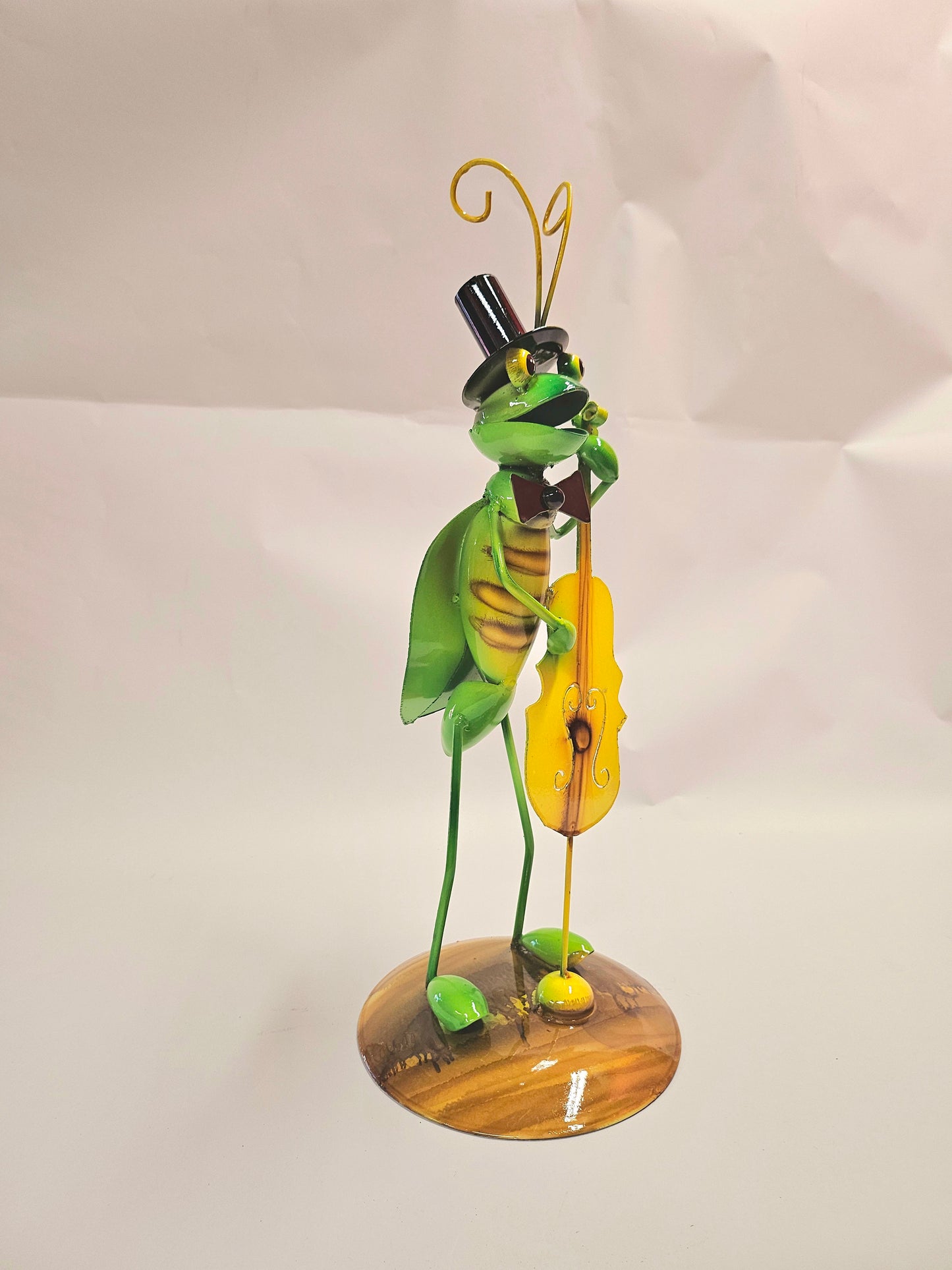 Handcrafted metal musical grasshopper