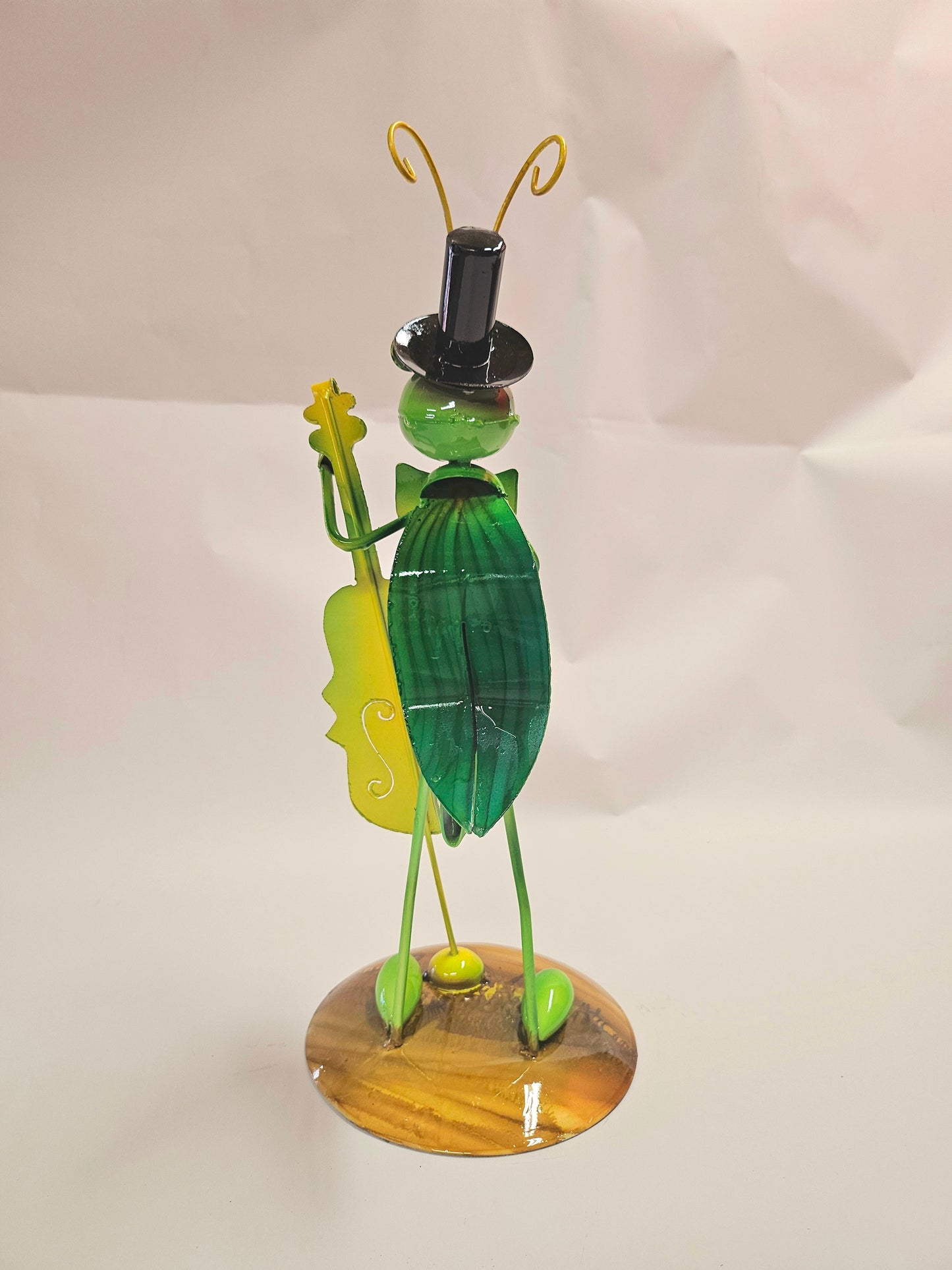 Handcrafted metal musical grasshopper