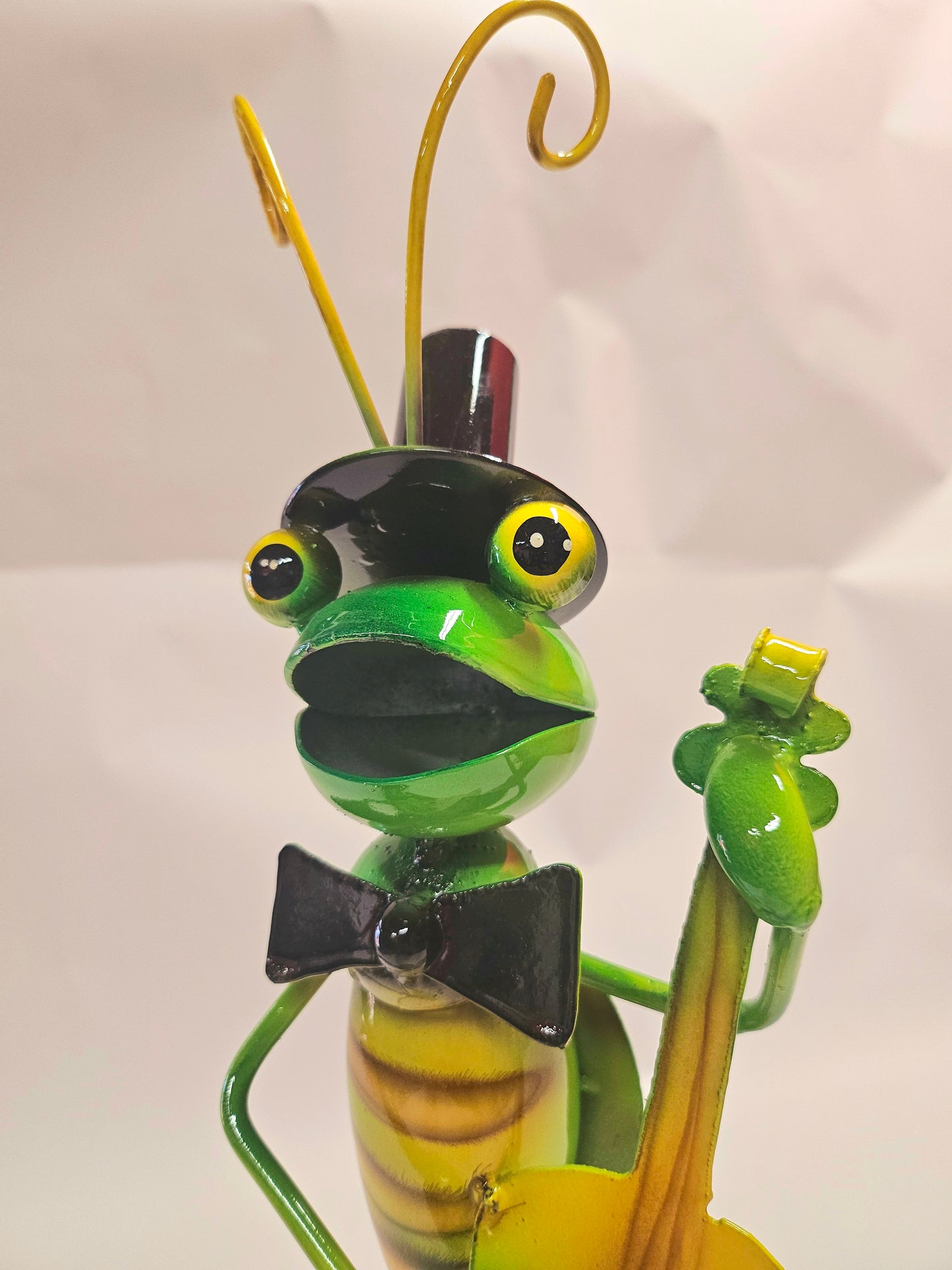 Handcrafted metal musical grasshopper