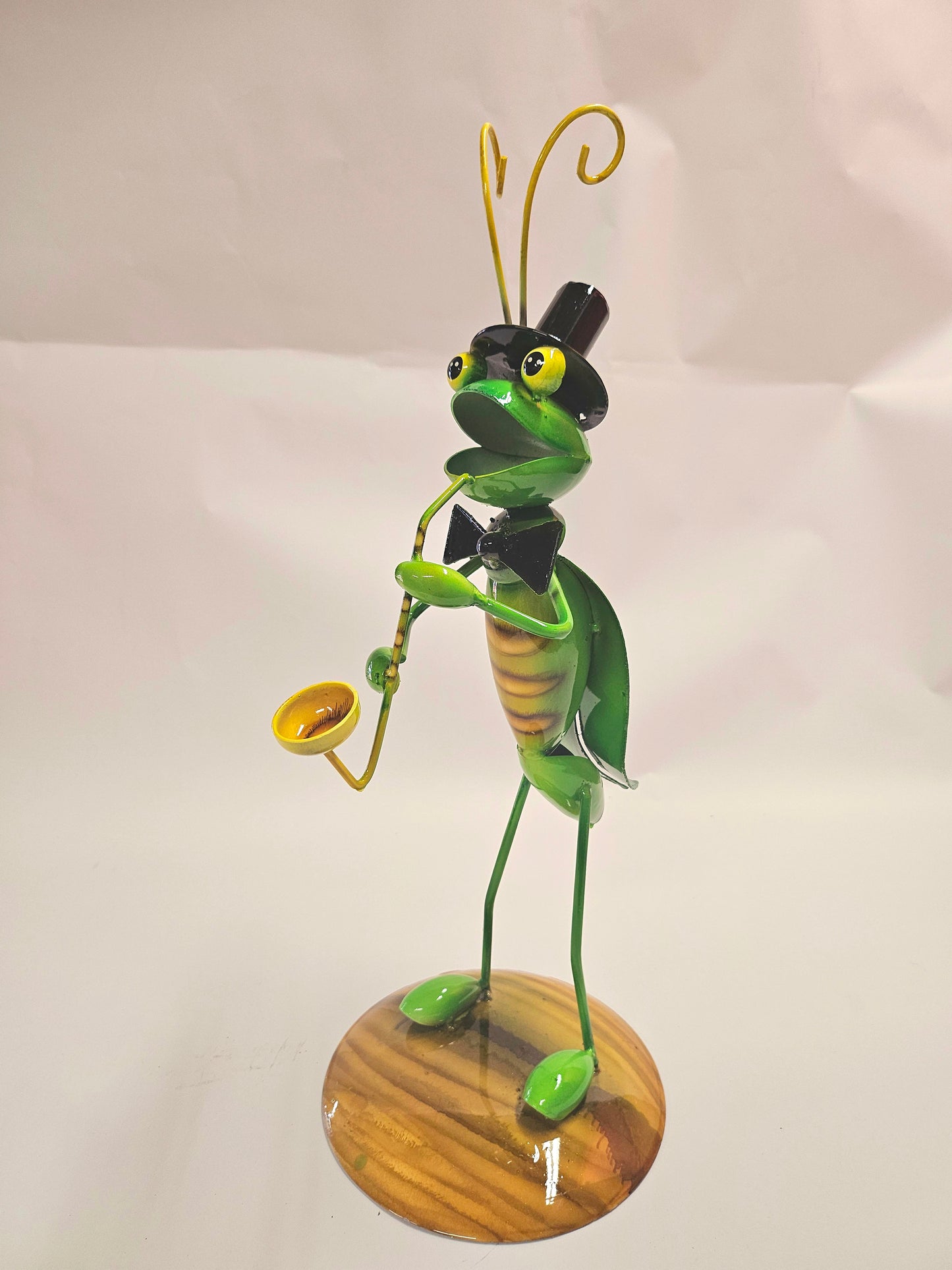 Handcrafted metal musical grasshopper