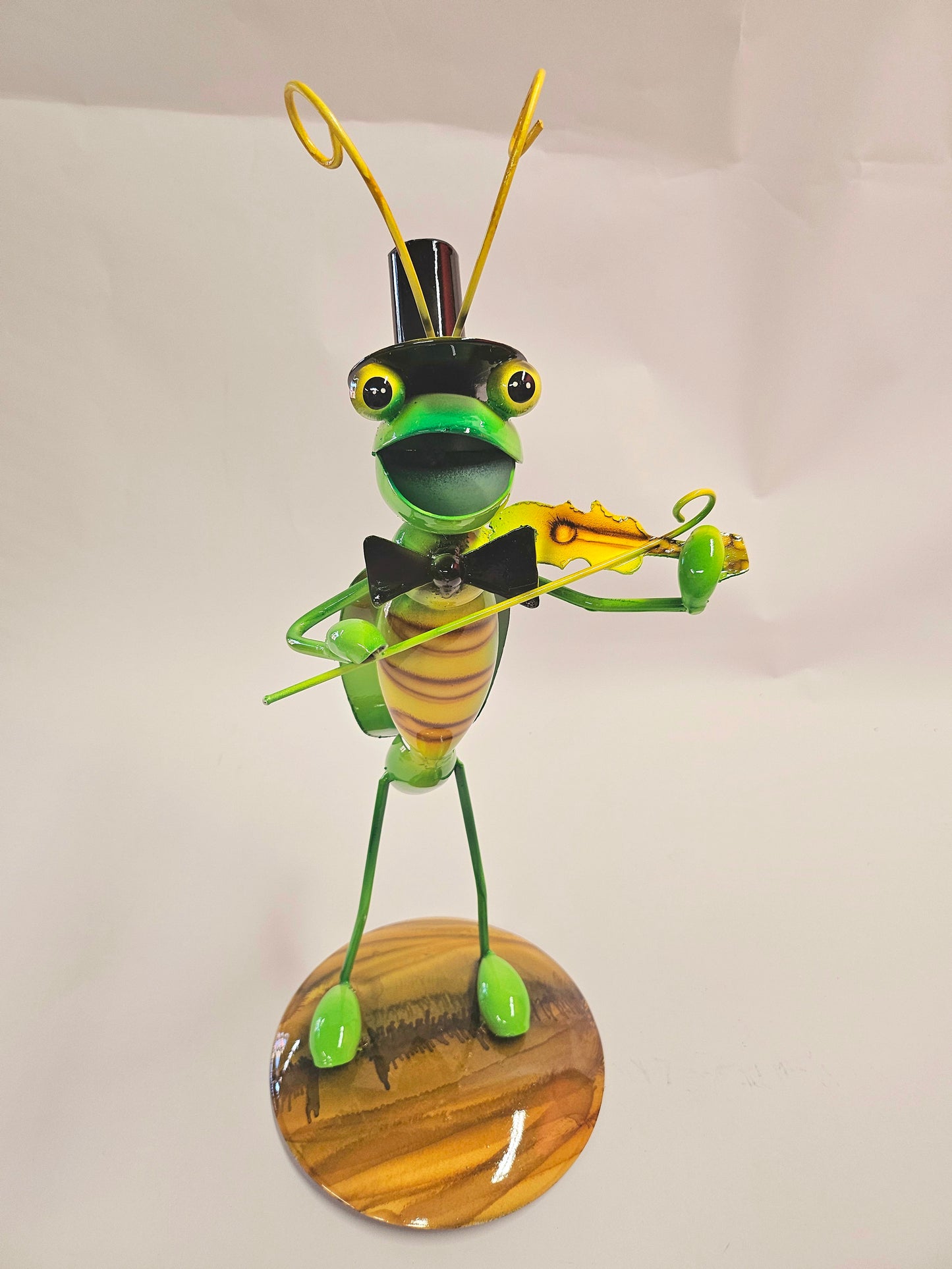 Handcrafted metal musical grasshopper