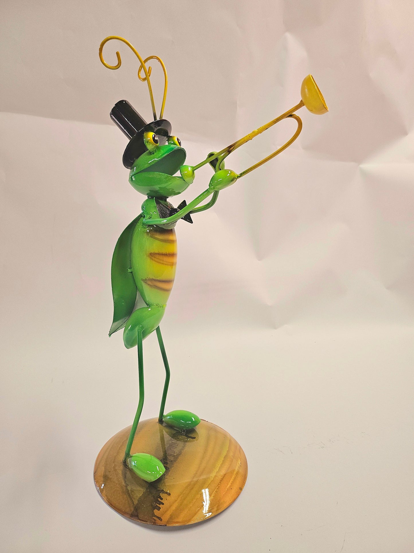 Handcrafted metal musical grasshopper