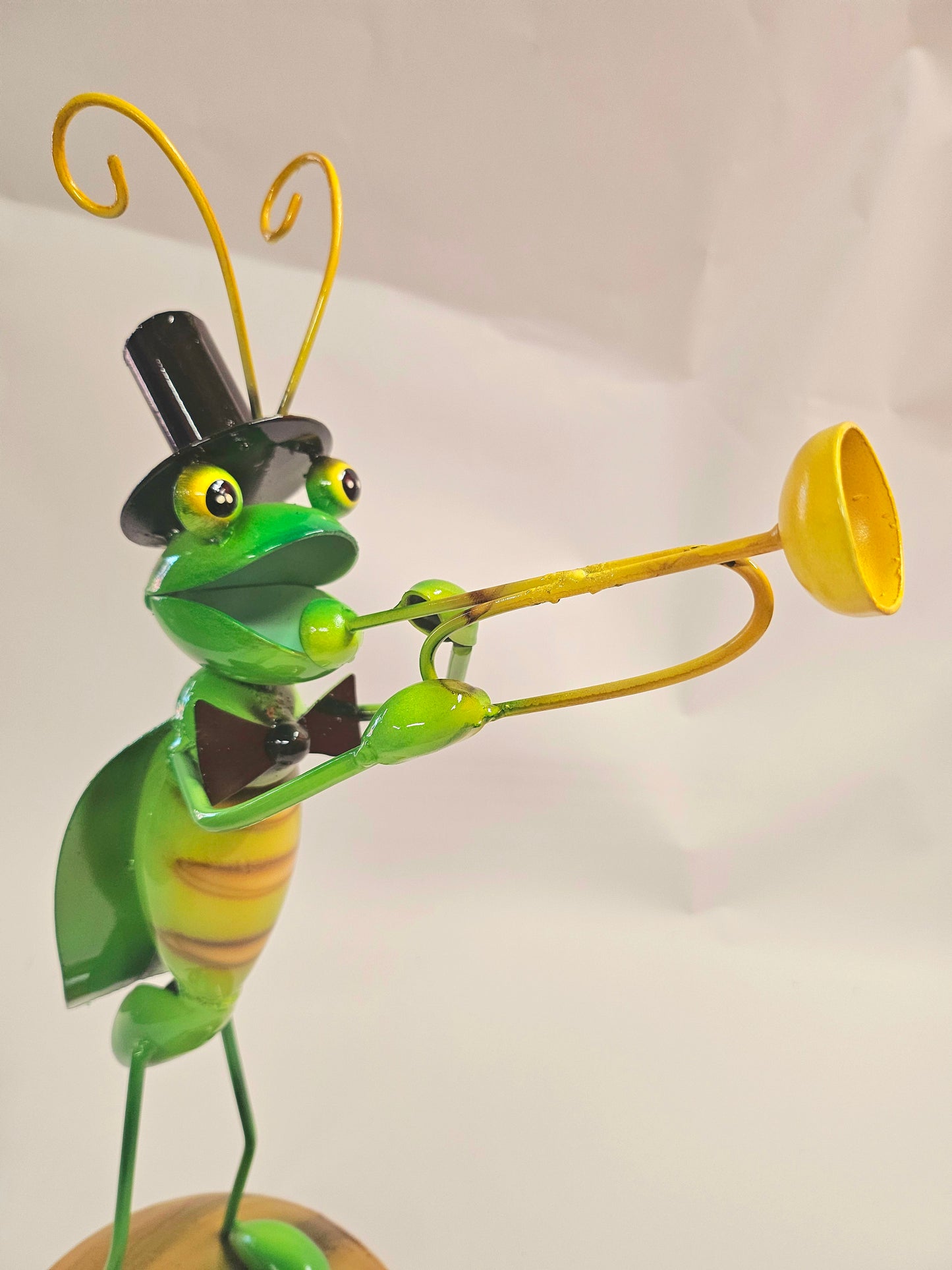 Handcrafted metal musical grasshopper